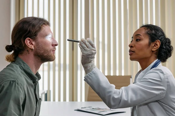 Man receiving eye exam